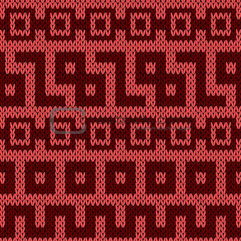 Knitting geometrical seamless pattern in red hues