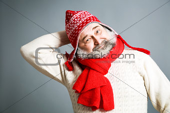 Happy Old Man with Beard in Red Winter Clothes