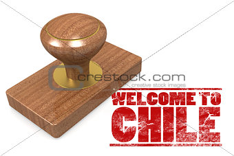 Red rubber stamp with welcome to Chile