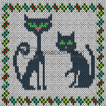 Knitting fabric pattern with two grey cats