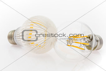 two LED bulbs with different cover, glass and plastic