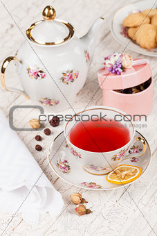 cup of red tea on serving table