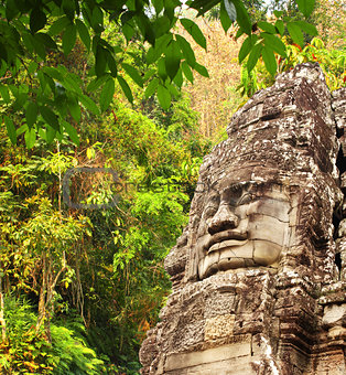 Giant stone face in Prasat Bayon Temple, Angkor Wat, Cambodia