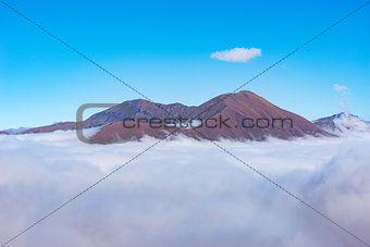 Mountain top above the clouds.