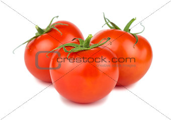 Three red ripe tomatoes