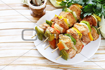 chicken kebab with onions and bell peppers