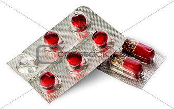 Pile of pills and capsules in package