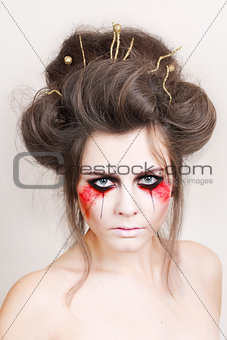 halloween make up beautiful model with perfect hairstyle. retouch