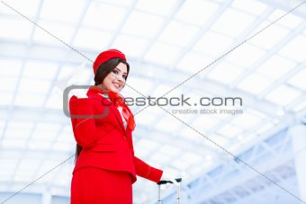 Smiling stewardess in a form