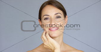 Cute single young adult woman with closed eyes