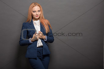 Red haired young model posing in studio