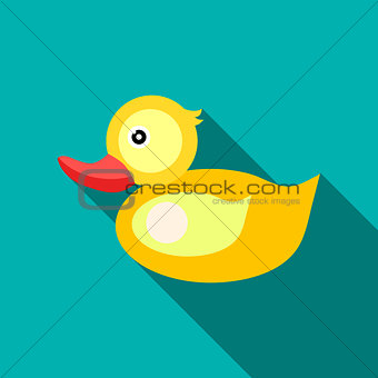 Children's toy duck on blue-green background