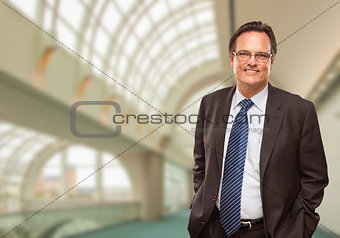 Happy Businessman Inside Corporate Building