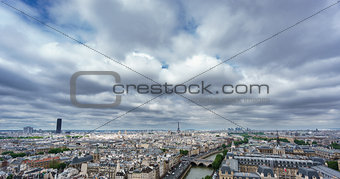 Eiffel and Montparnasse towers over Paris, cloudy day