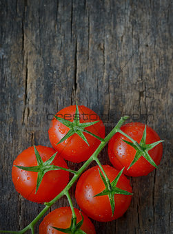 Cherry tomatoes on wooden