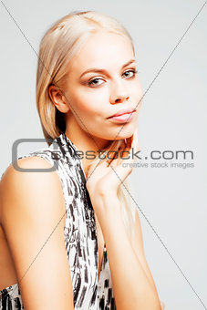 young pretty woman with blond hair on white background, sensual makeup, fashion sexy look, lifestyle people concept