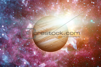 Planet Jupiter. Nebula on the background.