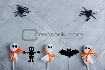 Halloween composition on gray concrete background