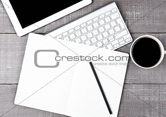 Keyboard with pencil and  coffee cup and tablet