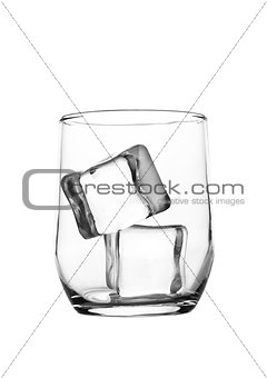 Empty whiskey glass with ice cubes isolated