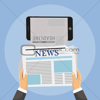 Hand holds phone and online reading news