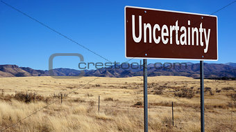 Uncertainty brown road sign