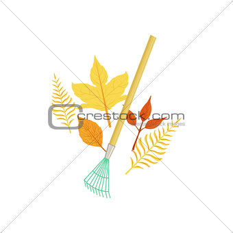 Rake And Fallen Leaves As Autumn Attribute