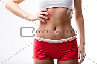 closeup of a good shaped woman's flat belly