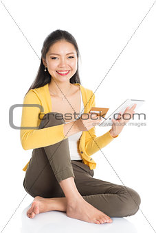 Young Asian woman internet shopping