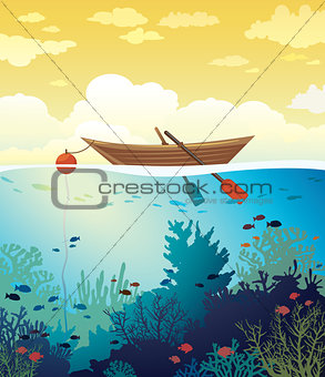 Wooden boat, sunset sky and underwater coral reef.