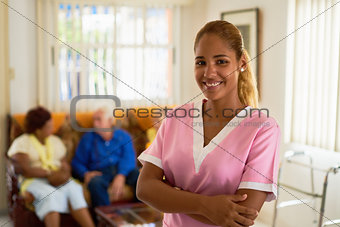 Happy And Confident Woman At Work As Nurse In Hospital