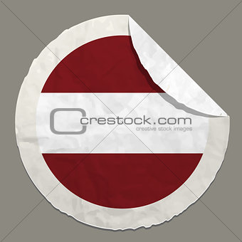 Latvia flag on a paper label