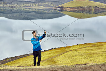 man hiker photographer