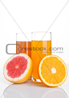 Glasses of healthy grapefruit  and orange juice