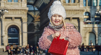 smiling elegant girl near Galleria Vittorio Emanuele II in Milan