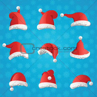 Christmas various hats set in cartoon style on blue background. 
