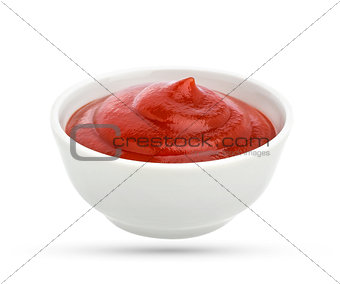 Bowl of tomato ketchup isolated on white