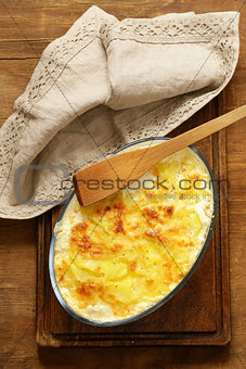 Traditional French potato gratin with cream and cheese