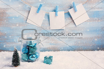 Vintage christmas composition: decorations, tree, gift and photo