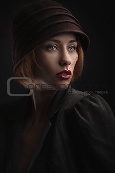 Beautiful woman in retro hat