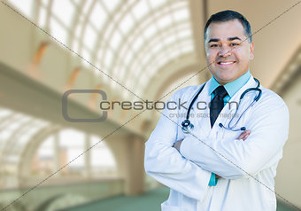 Handsome Hispanic Male Doctor or Nurse Inside Hospital Building
