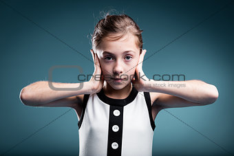 girl preventing herself to hear