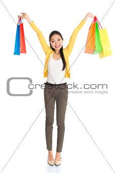 Asian female with shopping bags