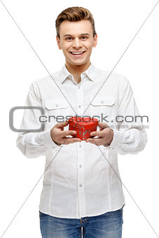 Man holding heart shaped gift