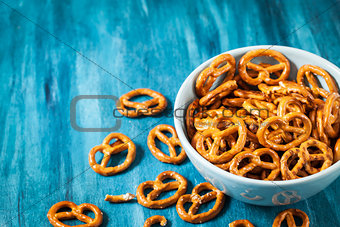Salty snacks mini pretzels in bowl
