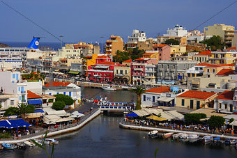 Agios Nikolaos, Crete, Greece. Agios Nikolaos is a picturesque town in the eastern part of the island Crete built on the northwest side of the peaceful bay of Mirabello.
