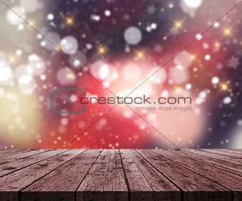 3D wooden table looking out to a defocussed Christmas bokeh ligh