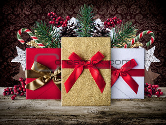 Xmas grunge decoration background with presents on wooden boards