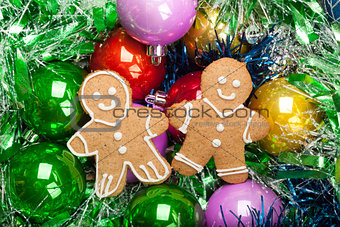 Gingerbread Christmas Men with bunch of Colorful baubles and tin