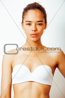 young pretty african american woman close up isolated on white background, asian mulatto tanned nude makeup, lifestyle spa people concept